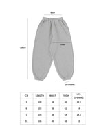 Gray sweatpants with size chart on a white background